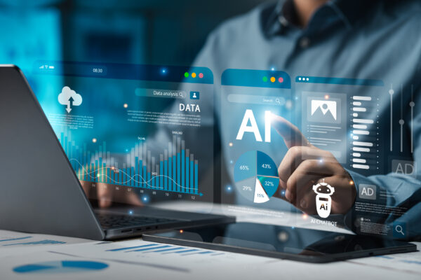 Businessman analyzes data using AI technology to work with tools.