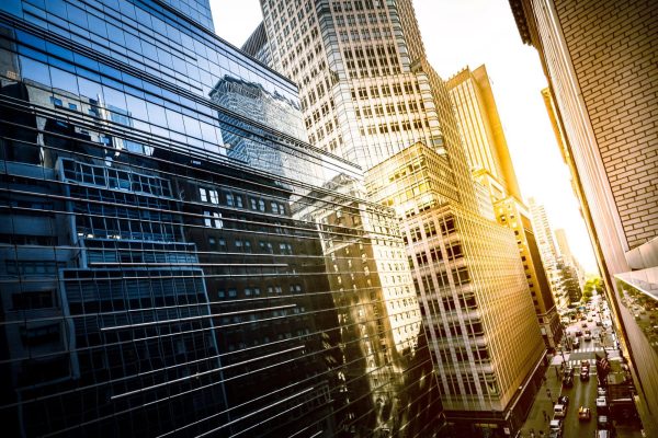 sun setting on building